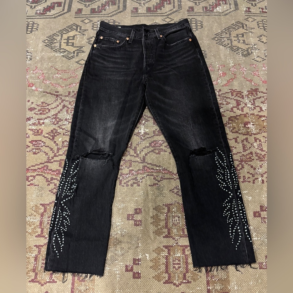 Studded black Levi’s straight leg denim